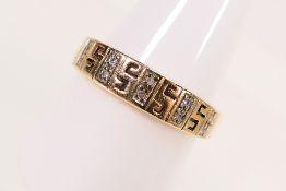 A 9ct yellow gold diamond set ring, size S+½, approximately 3.5 grams.