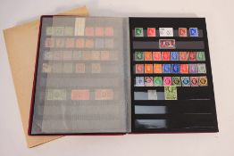 A stock book of British stamps, Victorian and later with some mint examples.