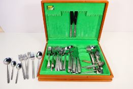 A canteen of Viners Country Garden stainless steel cutlery and a single silver souvenir spoon, 10.