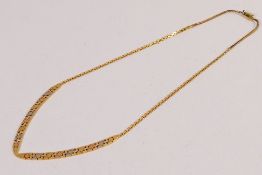 A tri-tone metal (stamped 750) necklace, approximately 46 cm (l) with box clasp,