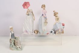Four Lladro figures, with damages, for restoration, largest approximately 27 cm (h).
