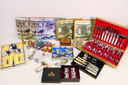 Lot comprising plated ware to include napkin rings, flatware and other, pair of brass candlesticks,