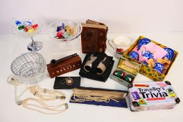 A mixed lot comprising glassware to include glass sweets, a boxed pair of Chinese baoding balls,