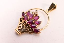 A small 9ct yellow gold stone set pendant in the form of a basket of flowers, 2.
