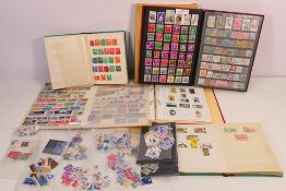 A collection of predominantly United States postage stamps including President celebrities and