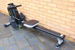 An Opti Magnetic Rower rowing machine.