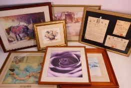 A collection of framed prints, various image sizes.