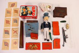 A mixed lot to include a cast iron Uncle