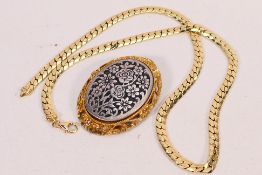 A French yellow metal (stamped 750) necklace, marked with eagle head hallmark to indicate 18ct,