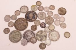 A collection of silver content British coins, Victorian and later to include an 1890 double florin,