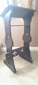 A vintage prayer stand with carved decoration measuring approximately 71 cm x 41 cm.