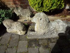 Architectural Garden Stoneware - three reconstituted stone figures depicting a recumbent Lion,