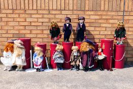 Eleven H Samuels porcelain dolls, Christmas Edition 1999 and 2000.