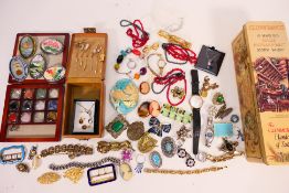 A collection of costume jewellery to include brooches, necklaces, rings, stick pins,