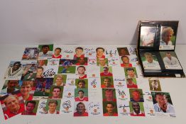 A collection of cards depicting sportsmen,