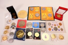 A collection of commemorative coins and