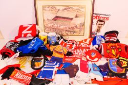 Football related memorabilia to include: A framed aerial view of Old Trafford, scarves, mugs,