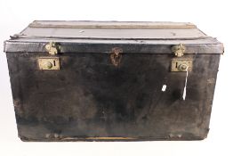 A vintage car trunk with twin leather ha