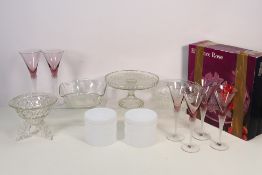 A collection of glassware of include boxed Japanese dishes, bowls, cake stand,