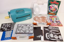 A Spellbinders Grand Calibur die cutting / embossing machine (untested) and two Magnetic Die