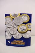 A Change Checker binder containing sixty