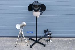 Three movie lamp style adjustable lights, largest approximately 98 cm when not extended. [3].