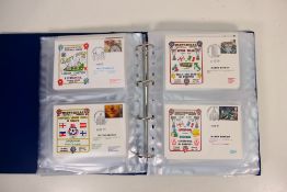A binder of football related first day c