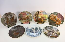 Royal Doulton cabinet plates to include African Series comprising Giraffes, Lioness, Lion and other,