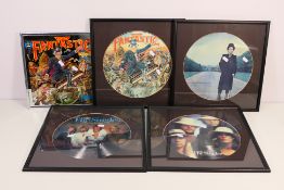 Lot to include four framed vinyl record picture discs comprising ABBA and Elton John and a similar