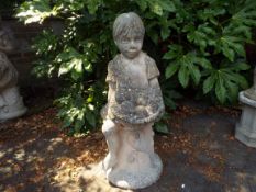 Architectural Garden Stoneware - a cast stone garden statue depicting a boy holding a basket of