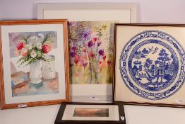 Four framed pieces of wall art comprisin
