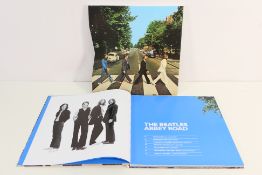 The Beatles - An Abbey Road Anniversary Edition box set of three audio CDs and one audio Blu Ray