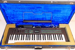 A cased Yamaha DX21 Digital Programmable Algorithm Synthesizer keyboard, untested.