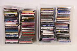 A large quantity of CDs (in excess of 120) to include: Ozzy Ozbourne, Dolly Parton, Eric Clapton,