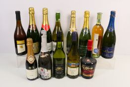 Thirteen bottles of wine and similar to include Champagne, Chardonnay, Cava, Chenin Blanc and other.