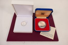 A 2019 fine silver coin, World's First Silver Sovereign, .999 fineness, 7.