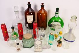 Mixed glassware to include chemical storage bottles, decanters, vases and other.