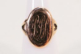 A 9ct rose gold signet ring, size J, approximately 3.8 grams.
