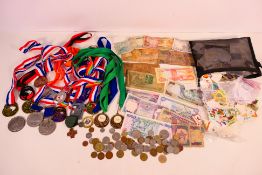A quantity of coins, banknotes, stamps, medals and similar.
