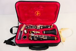 A John Packer clarinet, model JP 121 Mk IV, contained in protective case.