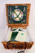 An Antler traditional wicker picnic hamper with contents.