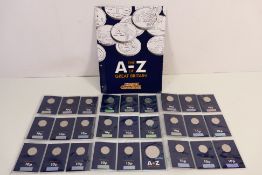 A set of twenty six Change Checker brill