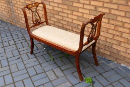 A hall bench with upholstered seat and lyre form ends, approximately 85 cm x 123 cm x 47 cm.