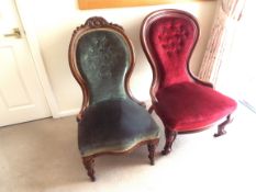 Two Victorian button back nursing chairs, one with red upholstery and one with green upholstery,