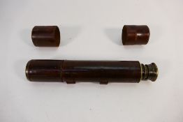 A vintage leather clad four draw telesco