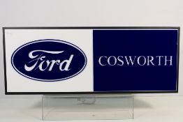 A Ford Cosworth lightbox measuring approximately 25 cm x 65 cm x 8 cm.