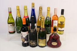 Twelve bottles of wine and similar to include Hennessy XO, Champagne, Chardonnay, Cava,