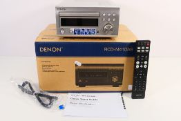 A boxed Denon CD Receiver, model RCD-M41DAB, with remote.