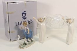 Lot to include a boxed Lladro group, # 5503, Hurry Now, two unboxed # 4870 figures,