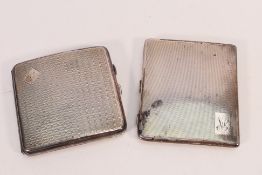 Two sterling silver cigarette cases, both of Birmingham assay, 1928 and 1938,